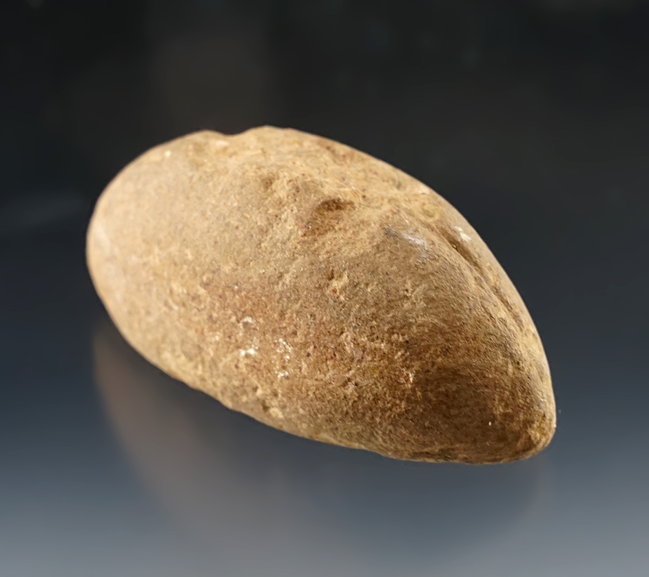 2 5/16" Loafstone made from patinated Sandstone. Slight groove on the top.