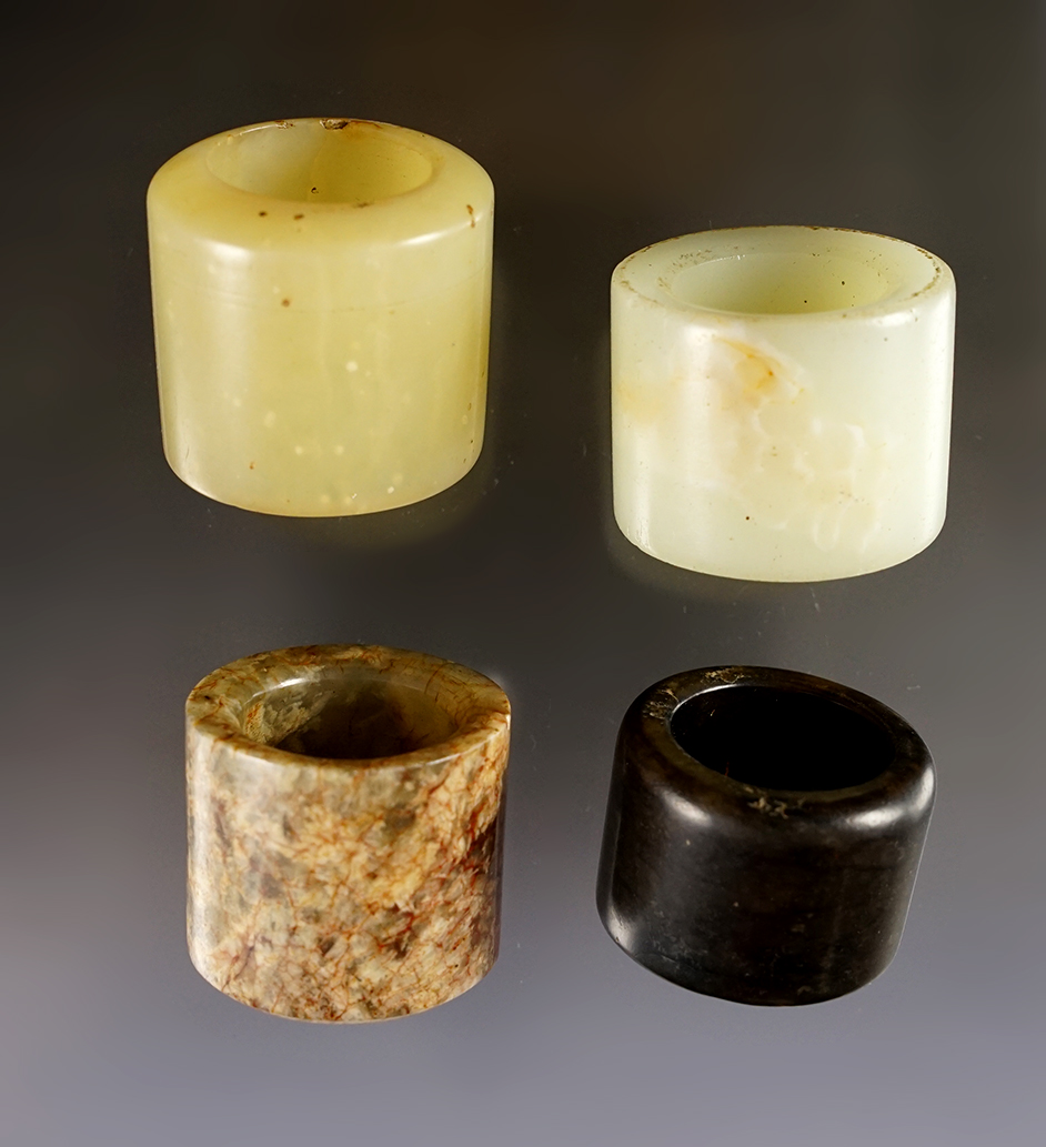 Set of 4 vintage Chinese Jade Rings. Recovered in Southeast Asia. Exact age unknown. 1 1/4".
