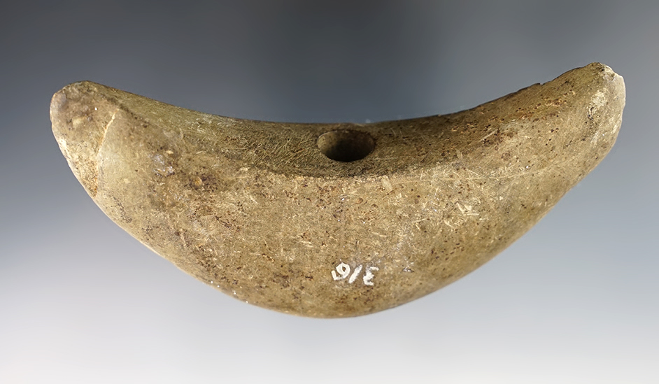 4 3/8" wide Crescent Bannerstone with slight ancient damage to one end. Heavily patinated.