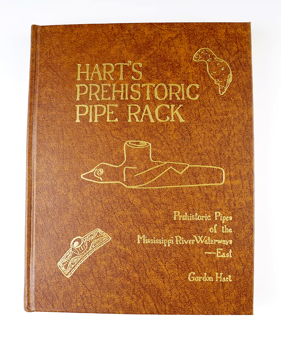 "Hart's Prehistoric Pipe Rack" by Gordon Hart. Signed by Gordon Hart. In pristine condition.
