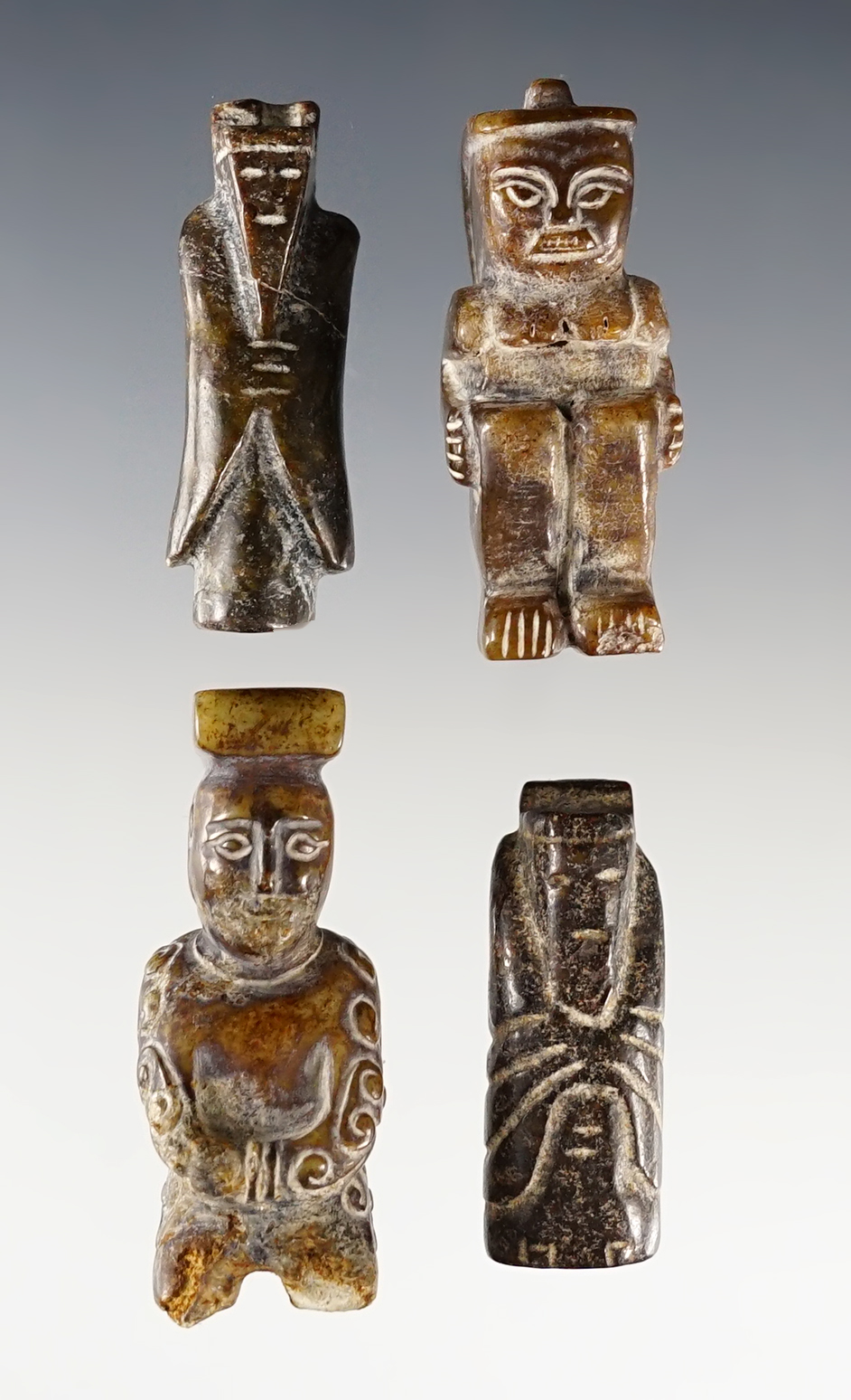 Set of 4 beautifully crafted jade figural beads/pendants found in Southeast Asia. Largest is 1 7/8".