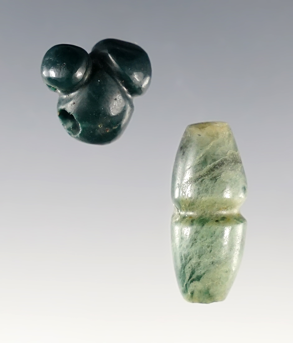 Pair of Pre-Columbian Jadeite and Jade Beads, recovered in Costa Rica. The largest is 15/16".