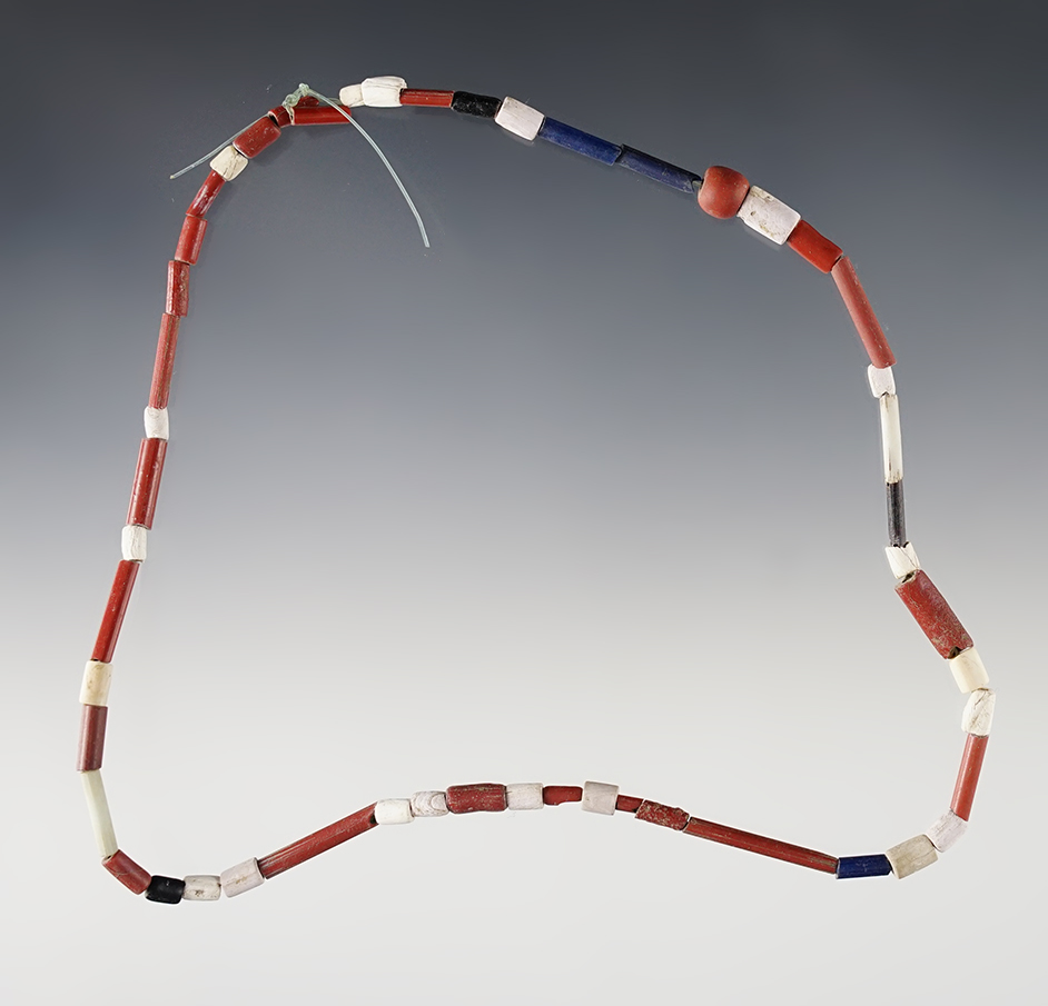 14" Strand of red, white and blue Tubular Straw Beads, Wampum and Redwoods. Lima, New York. 