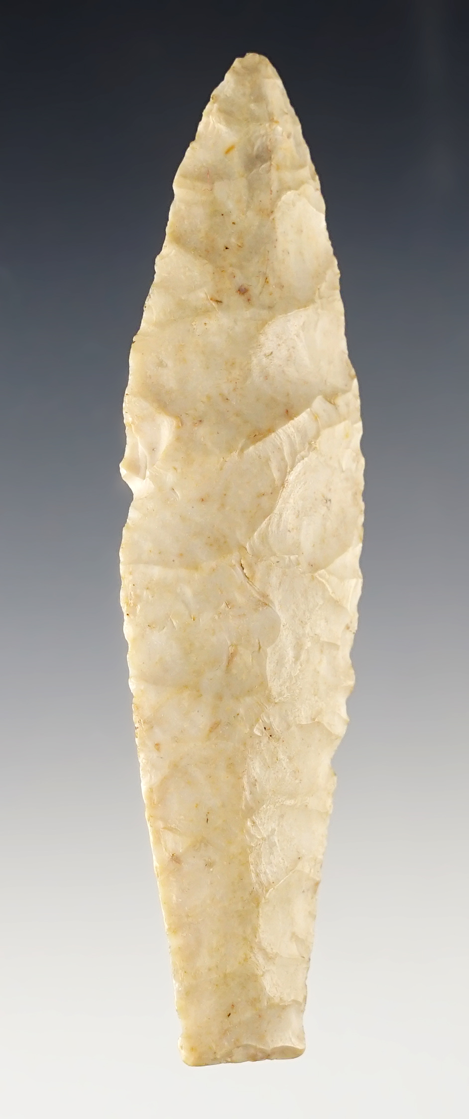 Well made 3 5/8" Agate Basin with heavy grinding to the lower blade edges and basal area. 