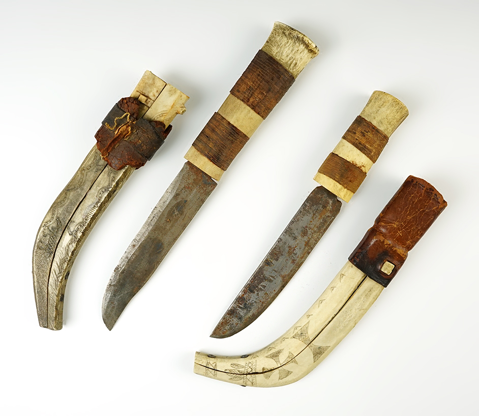 Pair of unique vintage bone and metal knives with hand carved decorated bone sheaths