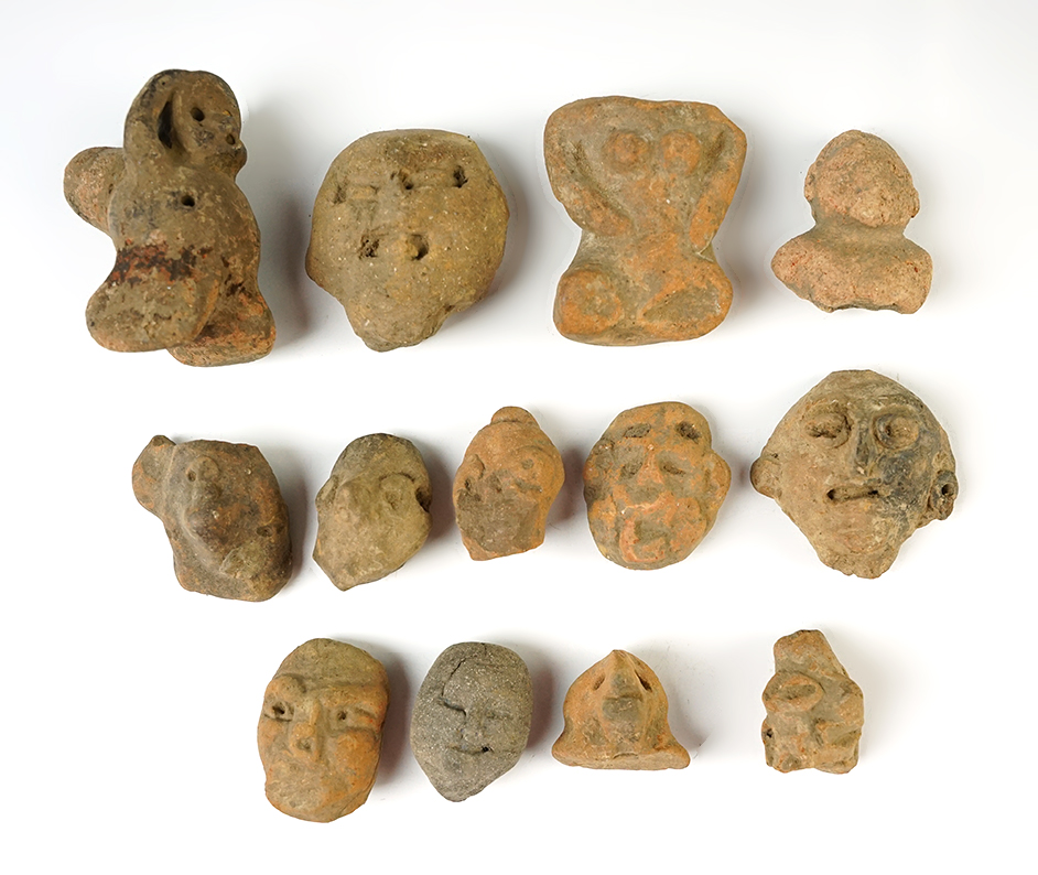 Set of 13 ancient Pre-Columbian pottery heads recovered in Mexico. Largest is 2 1/4".