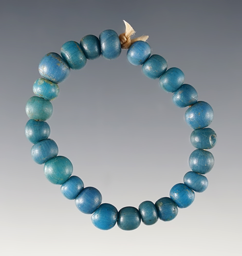 24 "Dutch Blue" Glass Trade Beads dating back to the early 1600's. White Springs Site, Geneva, NY.