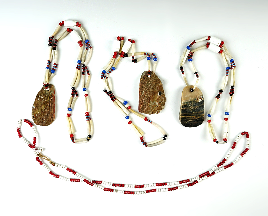 Set of 4 contemporary shell and bead necklaces that make a nice display.