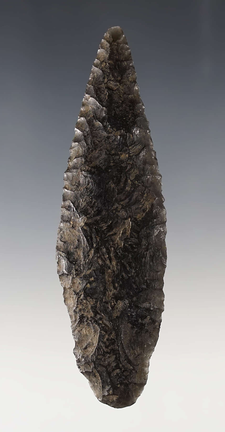 Heavily patinated Obsidian knife found in California.