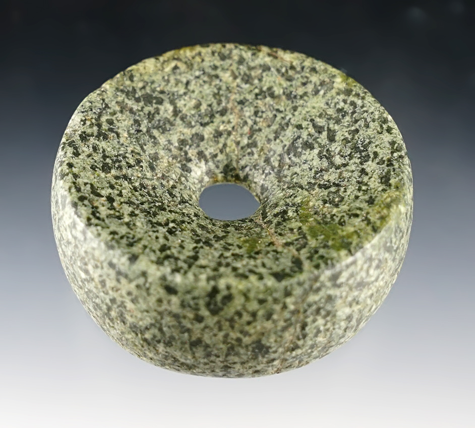 2" diameter Perforated Discoidal made from black and green speckled Hardstone. Illinois.