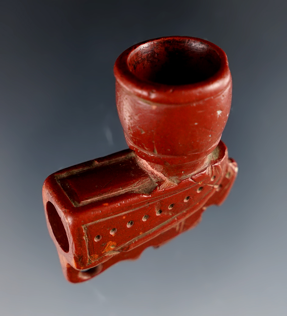 Highly stylized 1 5/8" x 1 7/8" Red Catlinite Pipe found in Seneca Co., Ohio. Pictured.