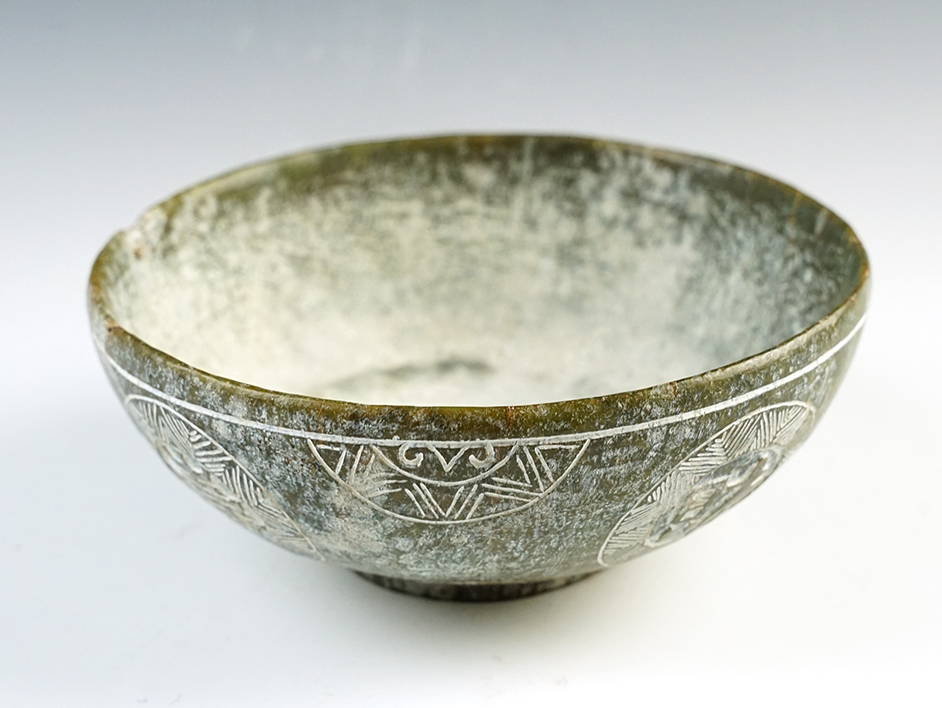 6" diameter by 2 1/2" tall hand carved Jade Bowl. Recovered in China. In excellent condition. 