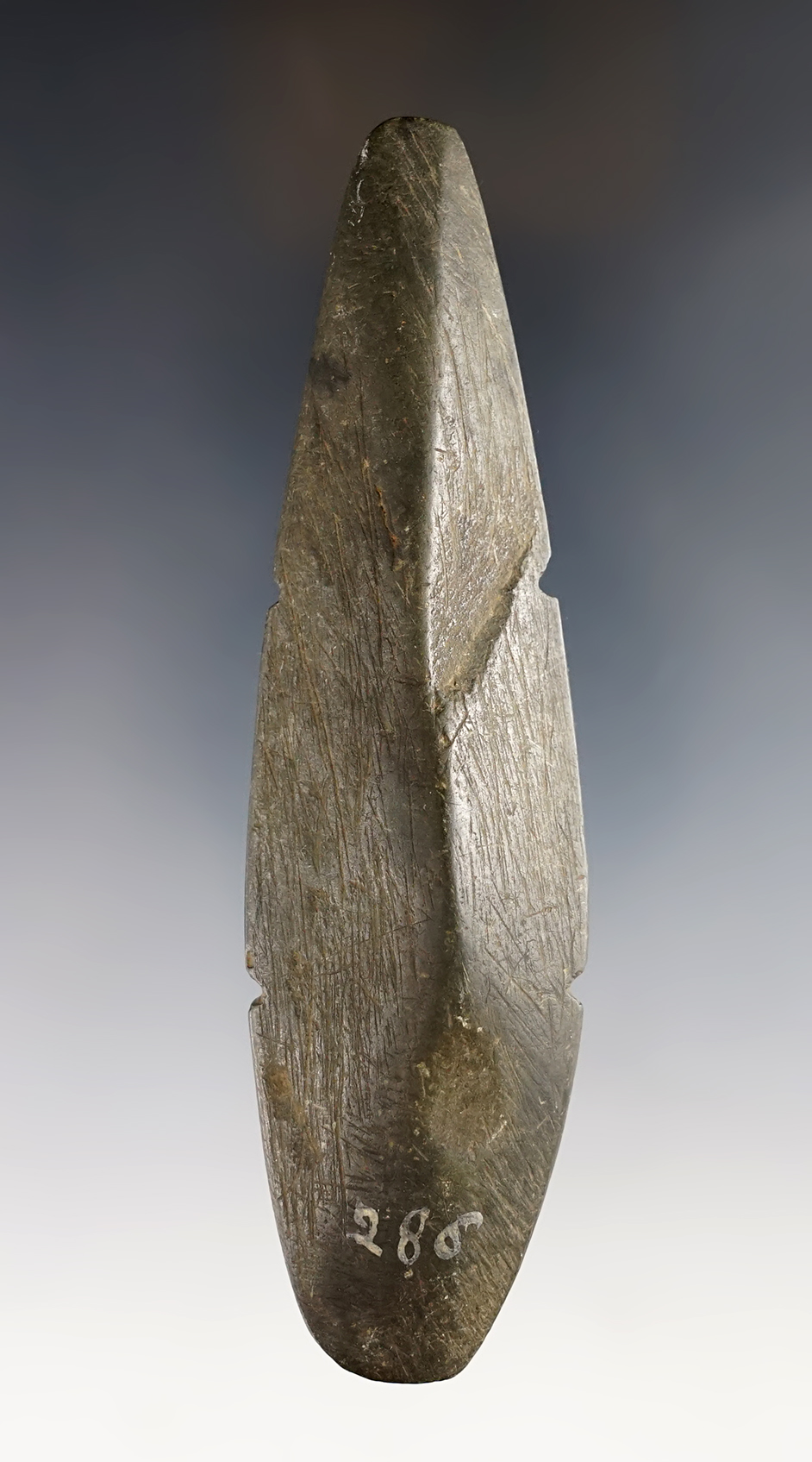 4 3/4" Ridged Bar Weight with four attachment notches. Made from Glacial Slate. Found in Ohio.