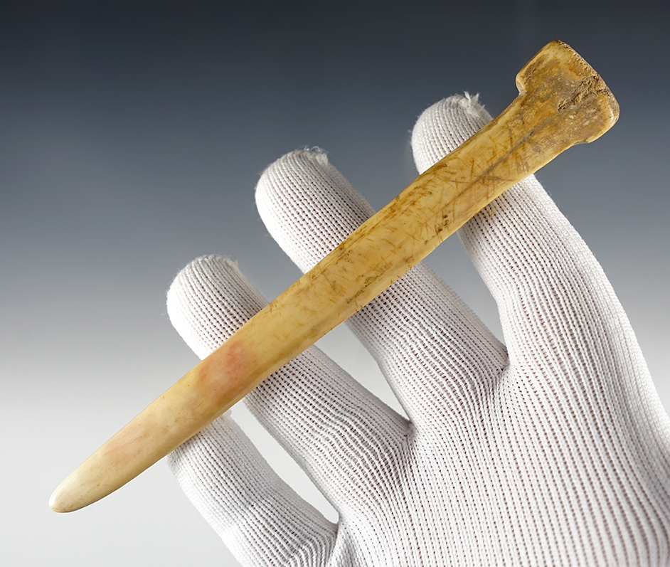 5 7/8" Highly stylized Bone Awl that is well polished. Found in Kentucky.