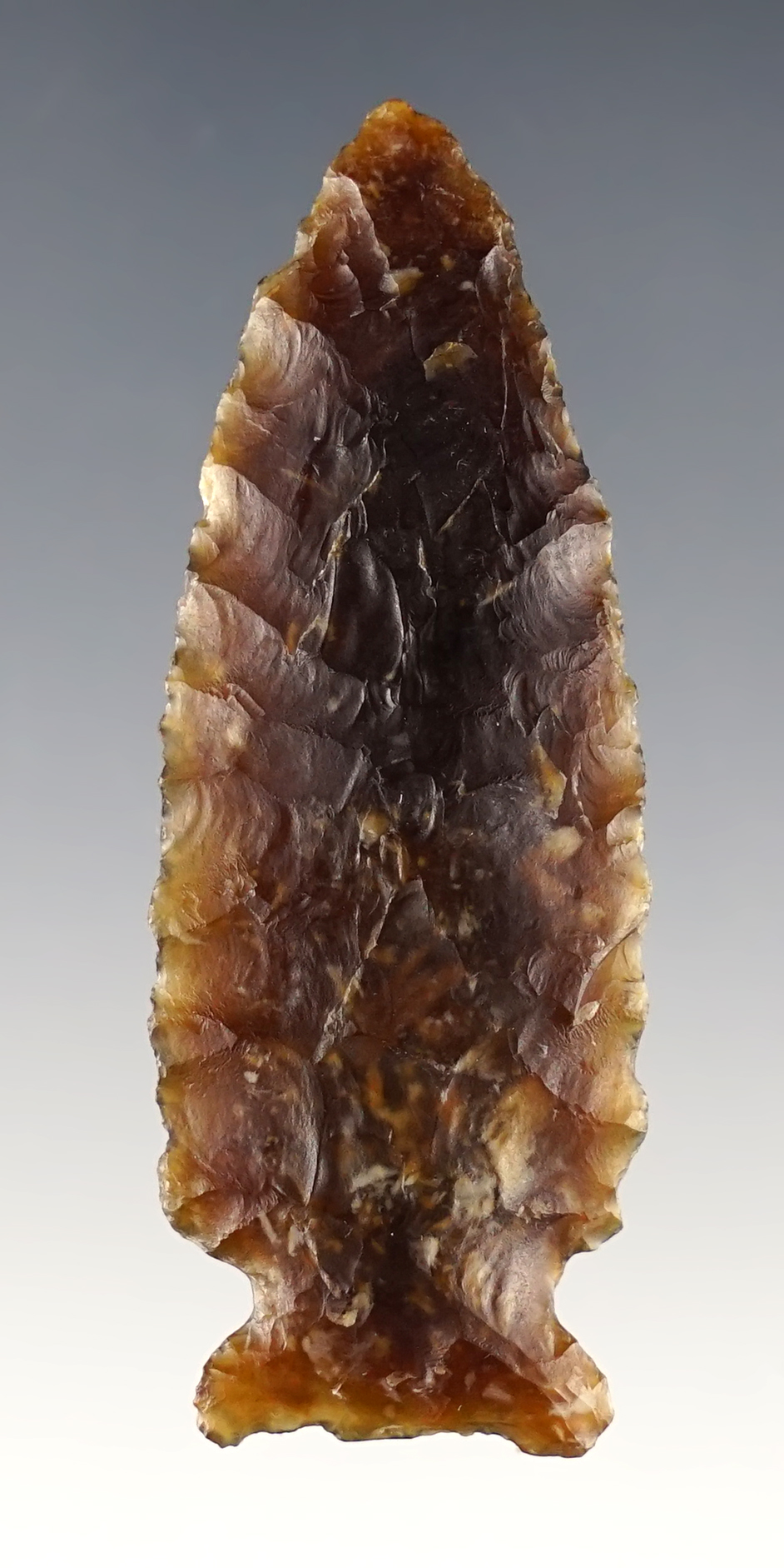 Nice 2 3/8" Logan Creek made from Knife River Flint. Found in Mountrail, North Dakota.