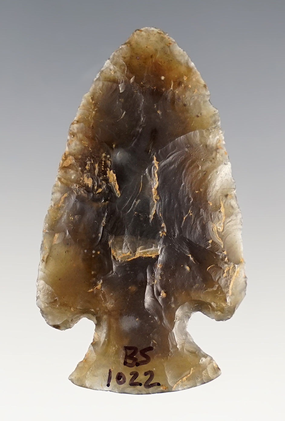 Highly translucent 2" Archaic Cornernotch. Made from Knox chert. Found in Kentucky.