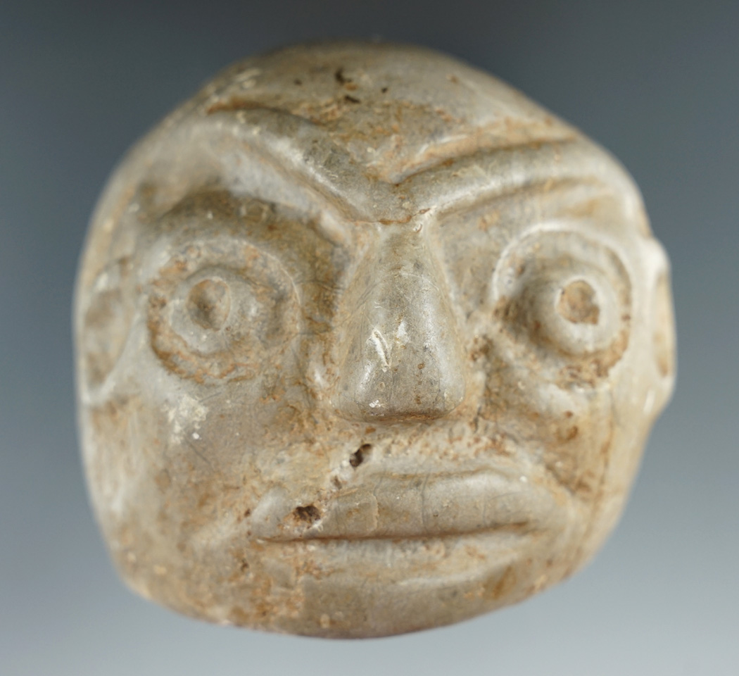 3" tall pre-Columbian human face effigy stone found in Peru.