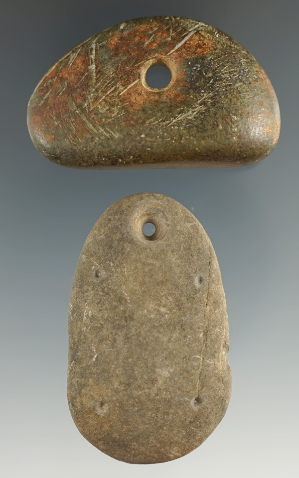 Pair of drilled pebble pendant found in Ohio, largest is 1 15/16" and has unique punctate marks.