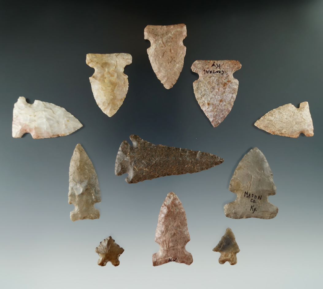 11 archaic points and knives found in Kentucky, largest is 2 9/16". Some very well-made points!