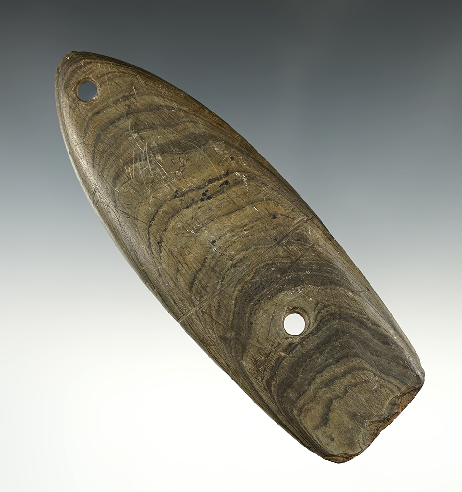 Heavily patinated 5 5/8" Gorget that was anciently salvaged. Some tallies and a groove engraved