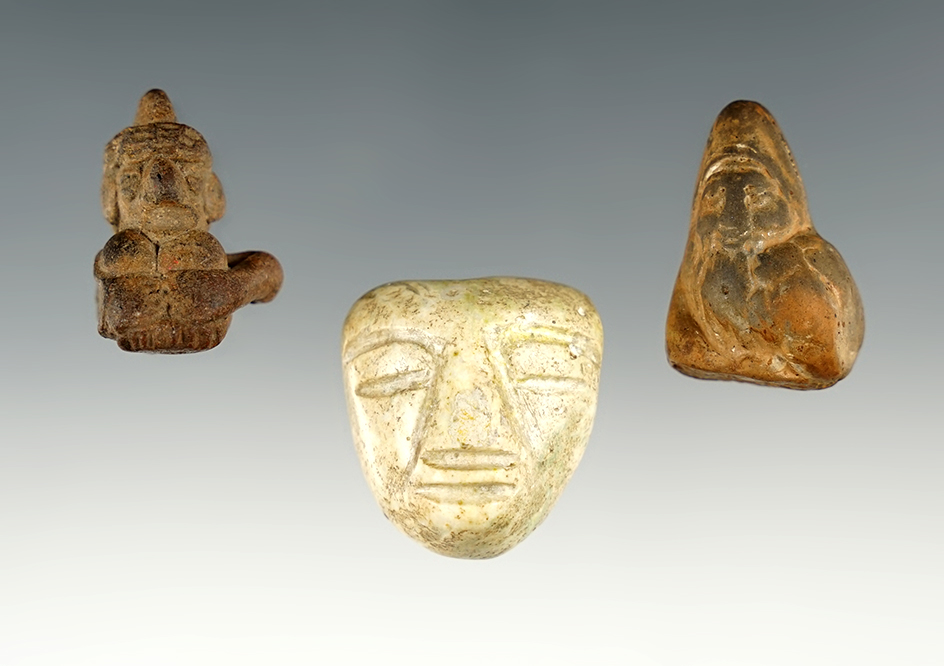 Set of three Pre-Columbian figural pendants. Largest is 1 1/4".