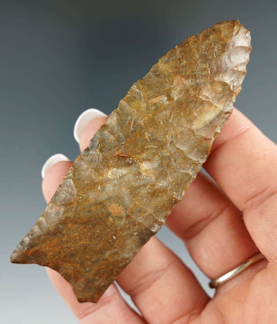 Heavily patinated 3 5/16" Paleo Fluted Clovis found in Johnson Co., Tennessee. Ex. Jim Dressler