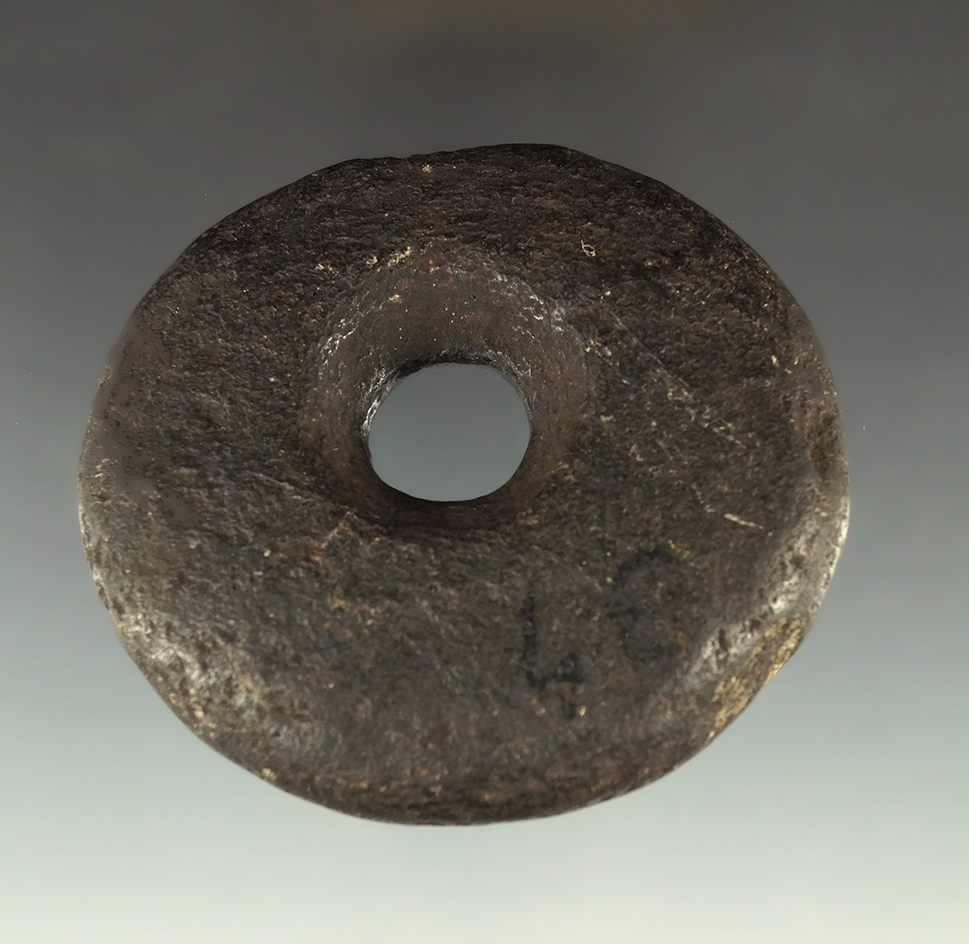 Very large perforated 3 1/8" Midwestern stone bead/pendant that is heavily patinated.