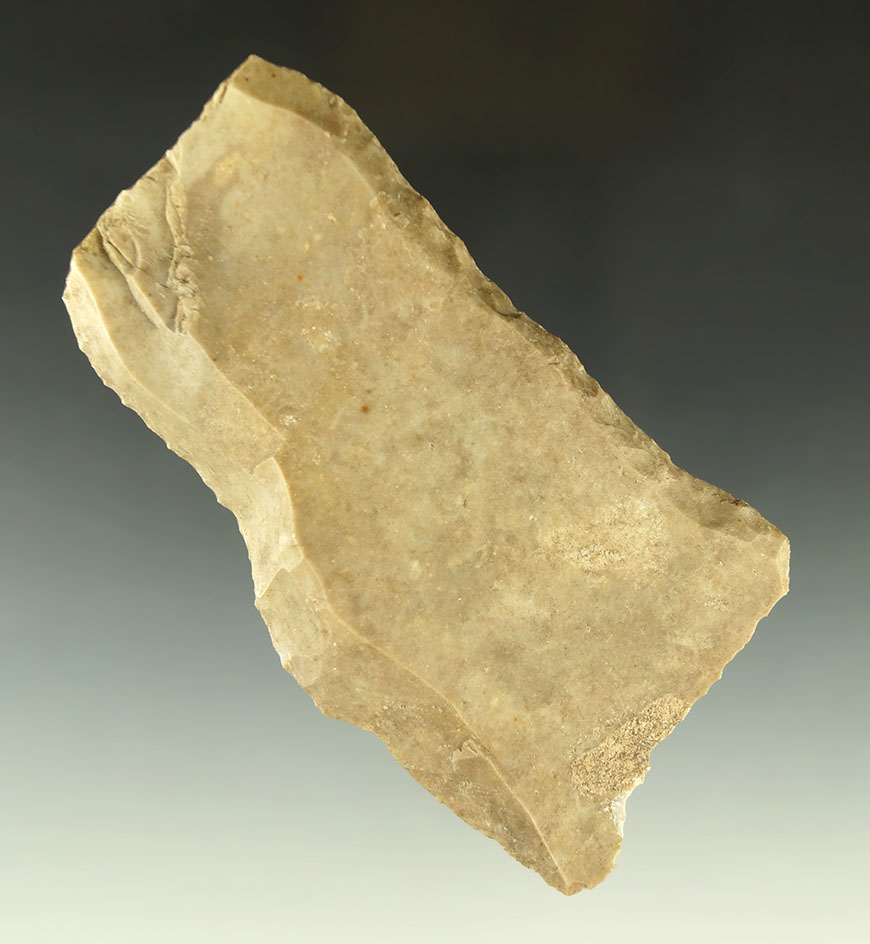 4 5/8" Paleo Uniface Knife that is heavily patinated found in Texas. Ex. Bill Arnold collection.