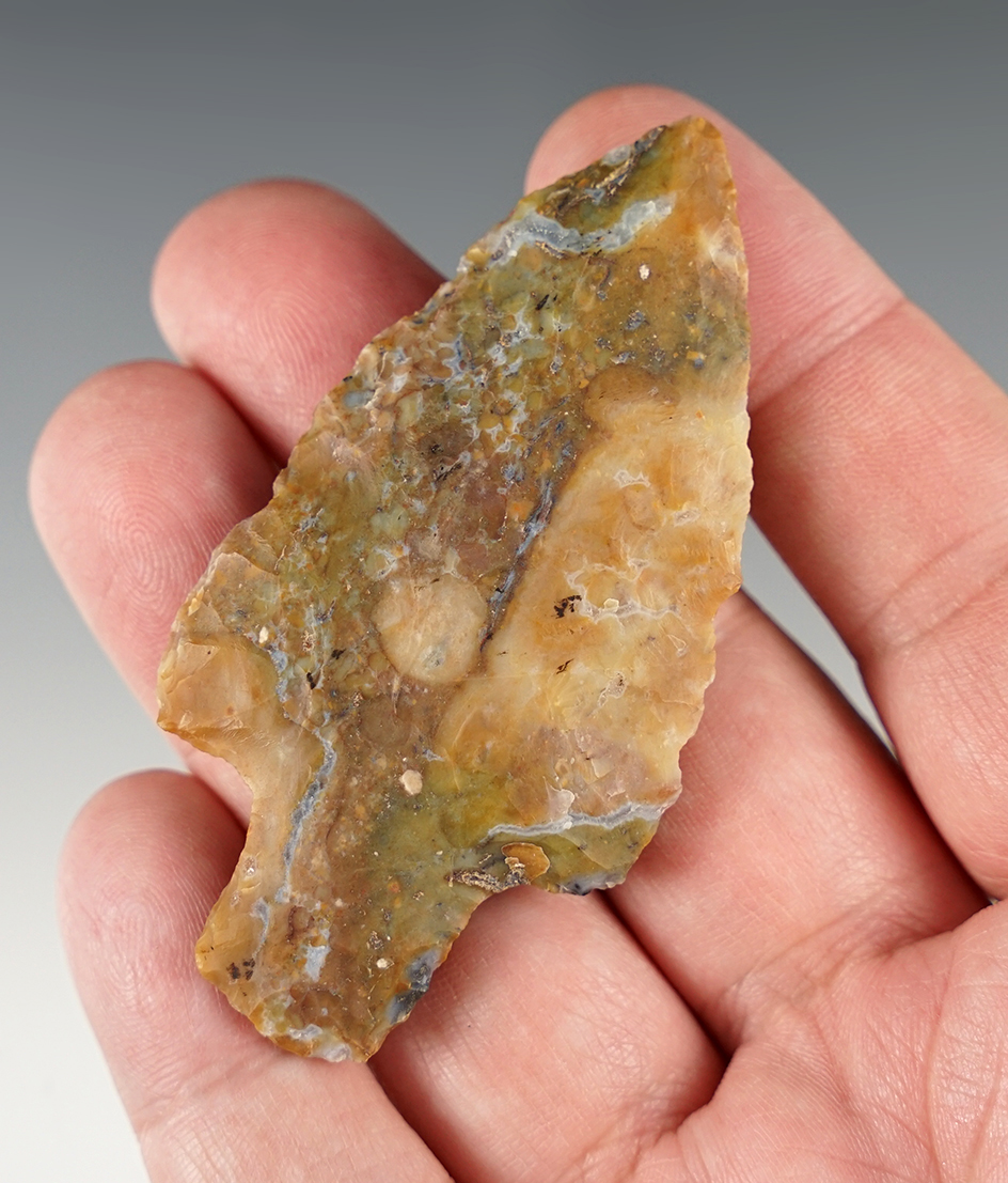 Heavily patinated 2 7/8" Adena made from multi-colored Flint Ridge Flint, found in Ohio.