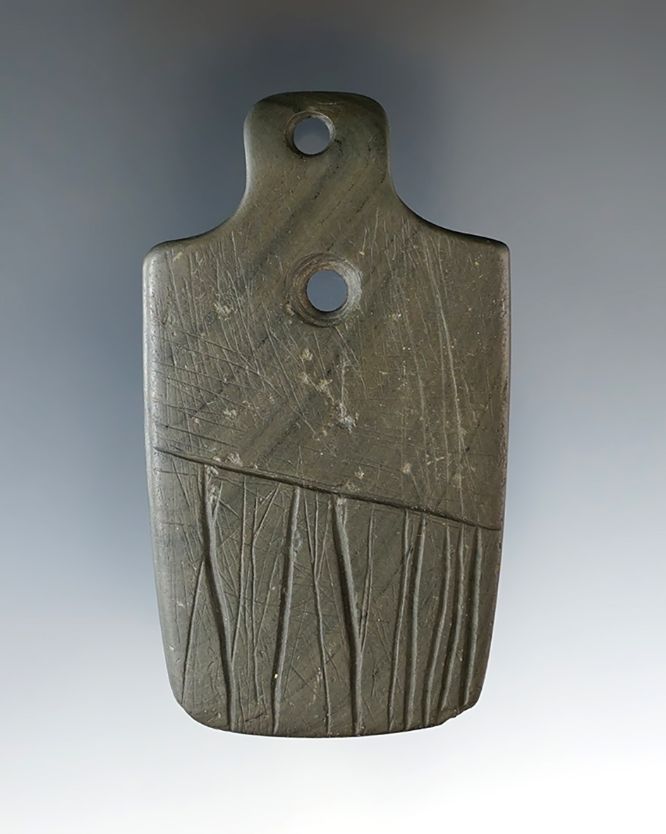 Highly engraved 2 7/8" Eclectic Two-hole Pendant/Gorget found in Clark Co., Ohio.