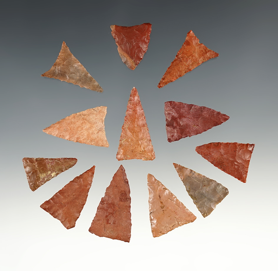 Set of 12 colorful and well made Triangle points found Tennessee. The largest is 1 1/4".