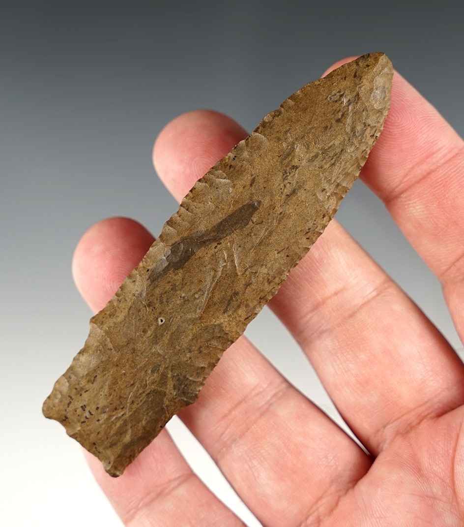 Well styled 3 11/16" Stemmed Knife made from Dover chert. Found in Tennessee.