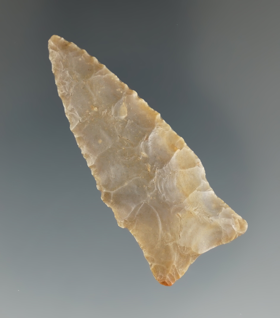 Nicely serrated 2 1/8" dart point found in East Texas.