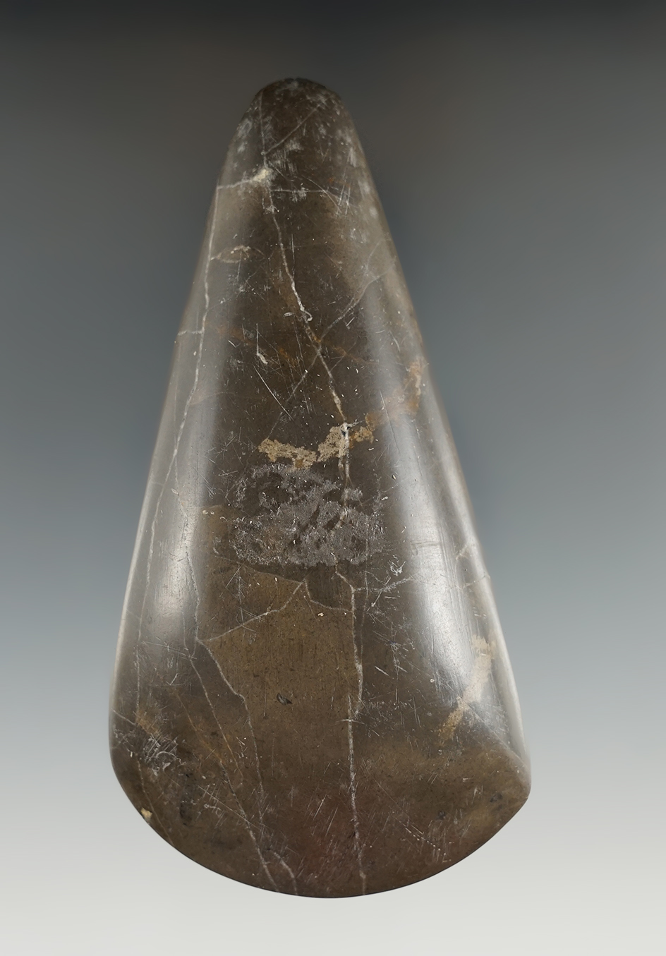 Highly polished 4 5/16" Pre-Columbian tapered poll Celt found in Meso-America.