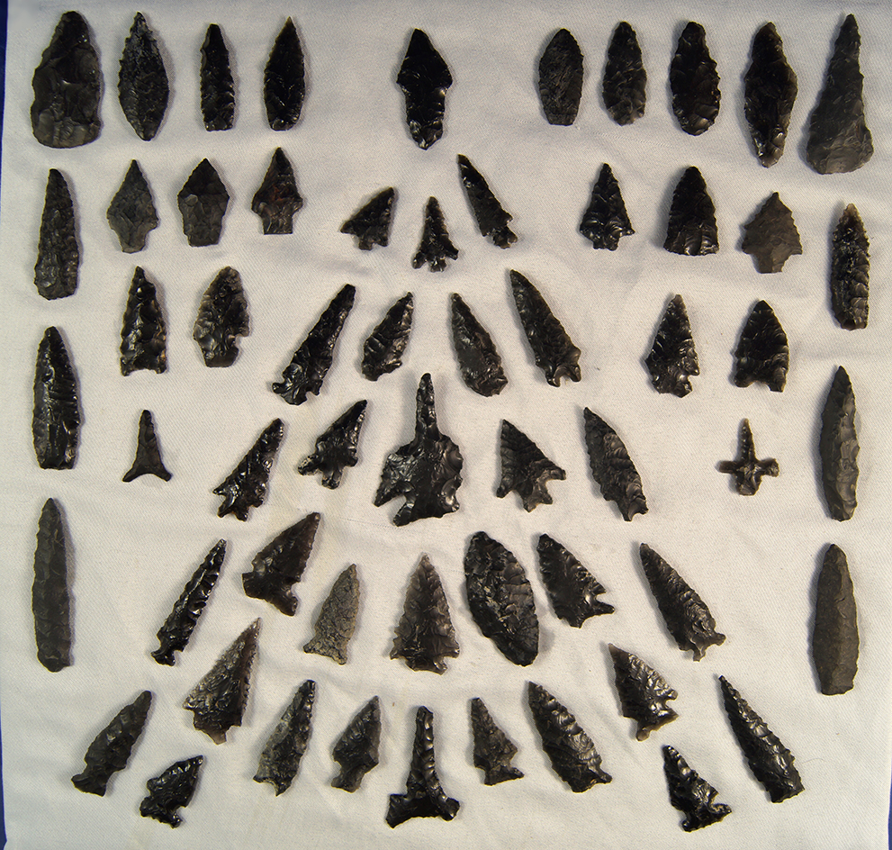 Beautiful set of approximately 59 Obsidian arrowheads glued to Styrofoam - Fort Rock Oregon.