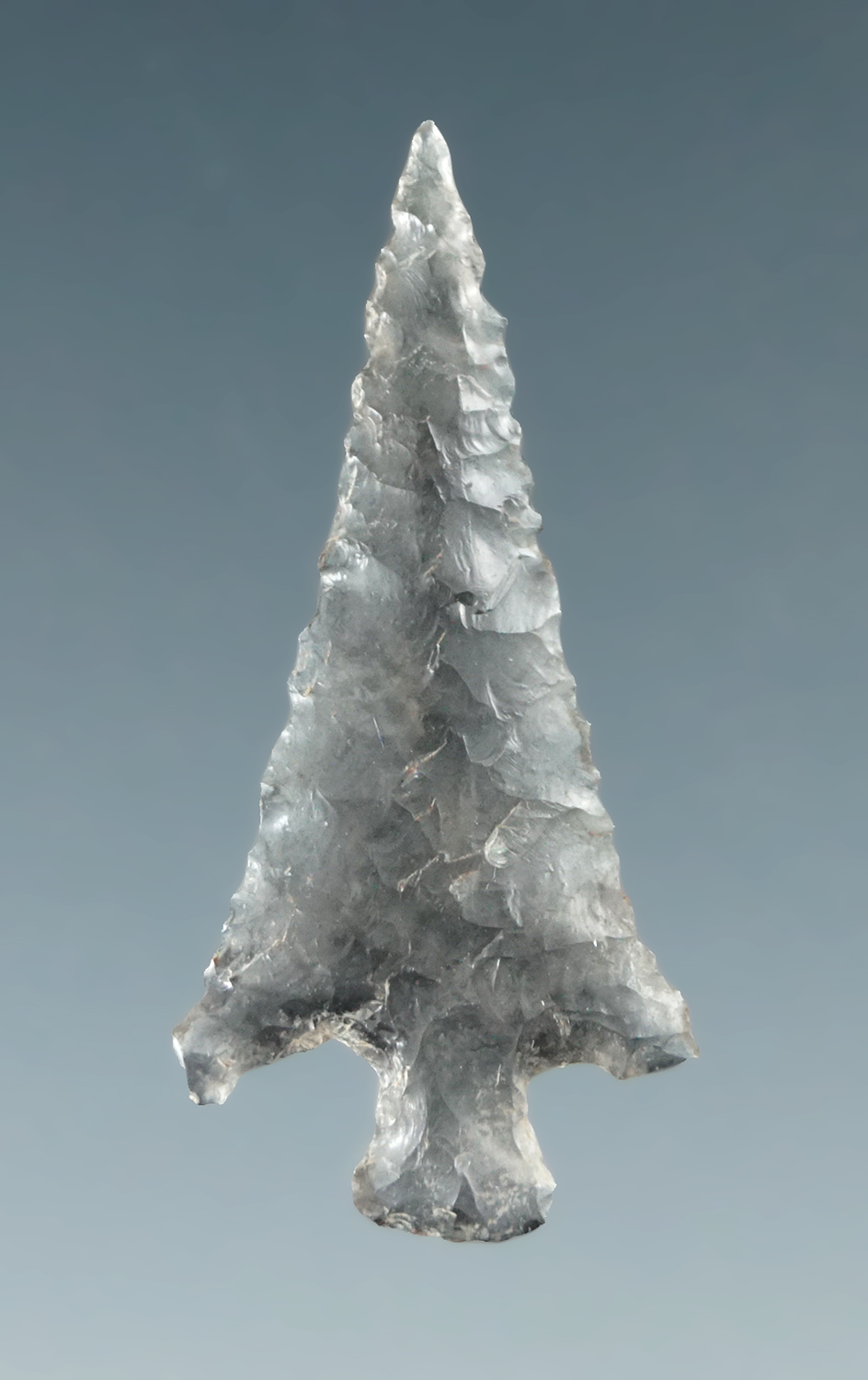 Excellent flaking on this 1 1/16" thin and well styled Columbia Plateau made from translucent obsidi