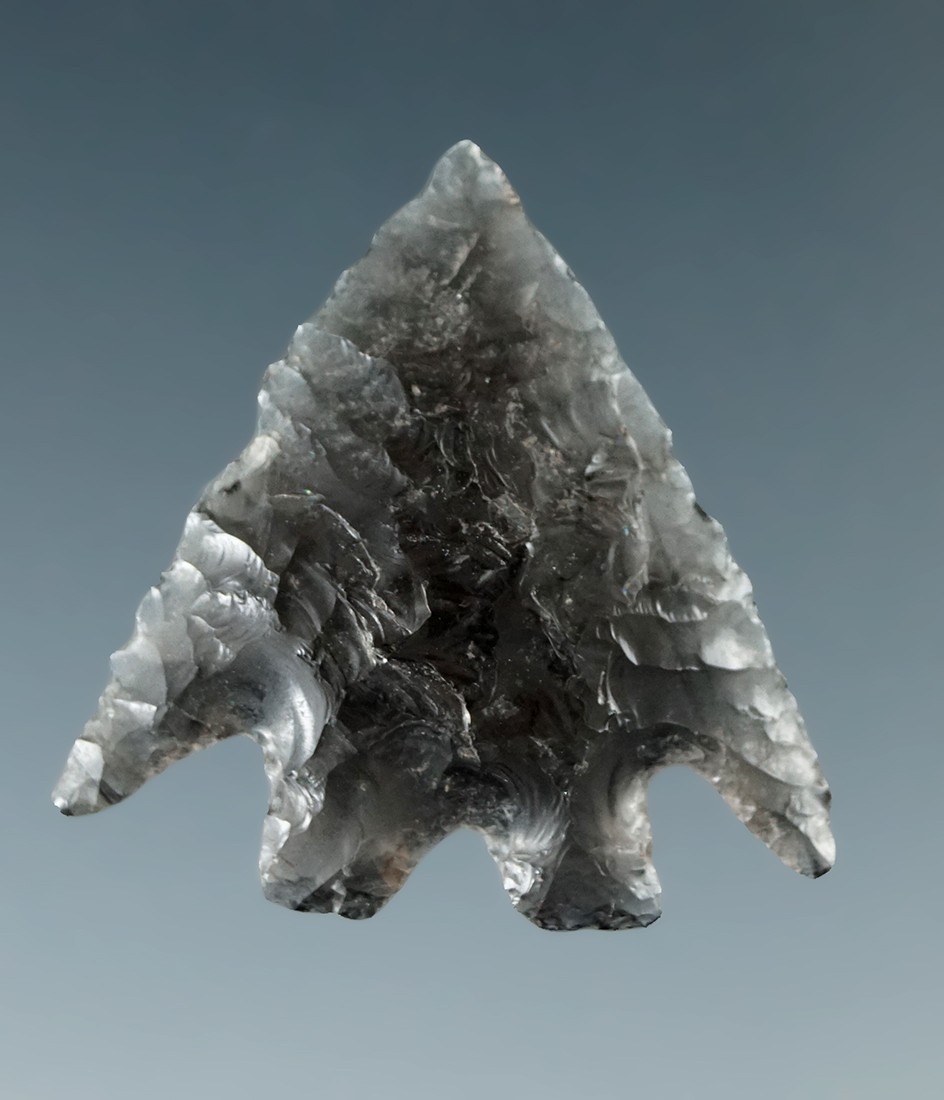 Beautiful style and workmanship on this 1" translucent obsidian Basal Notch found in Oregon.