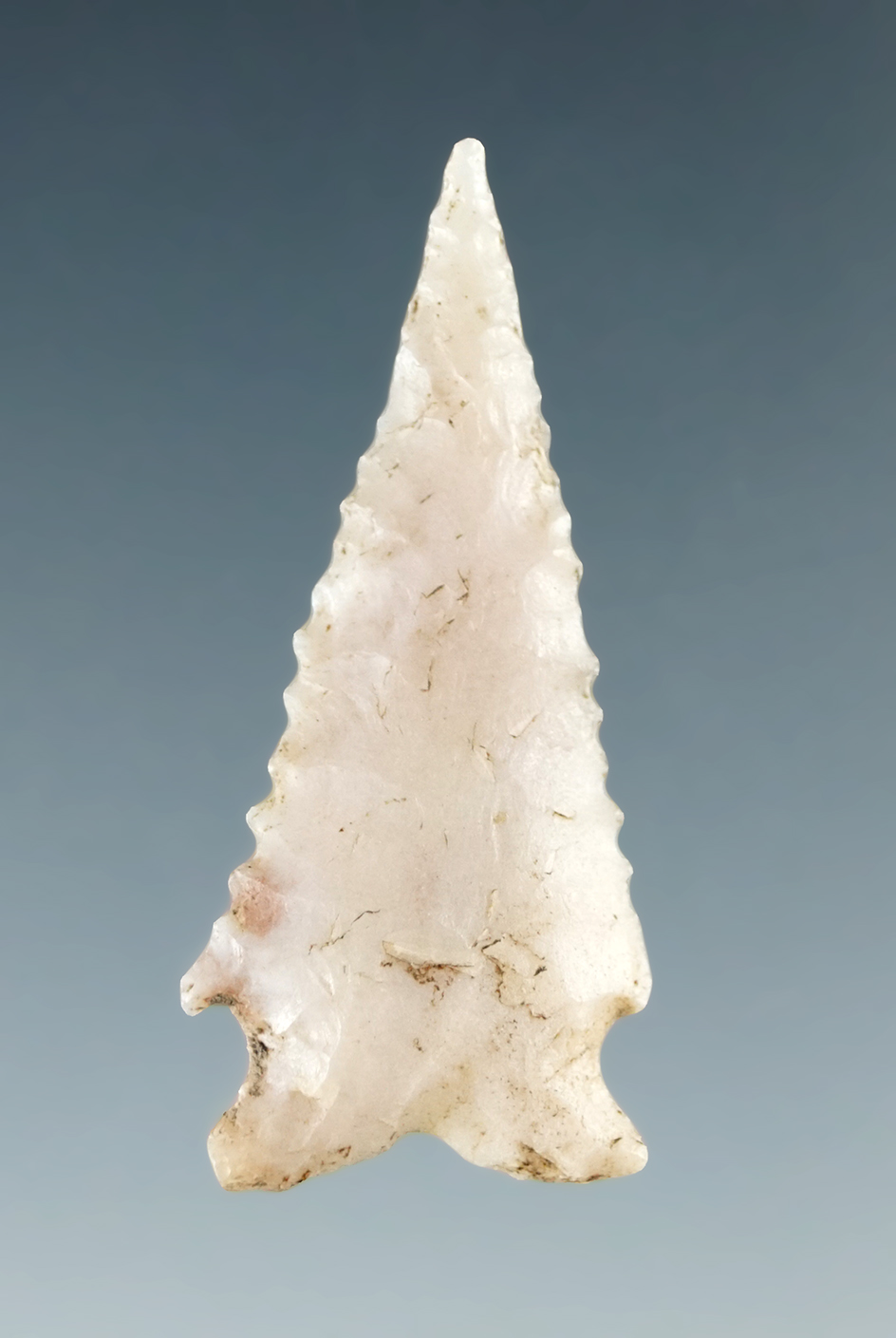 Exceptional fine serrated 1 1/4" Snake River dart point found near the Columbia River.