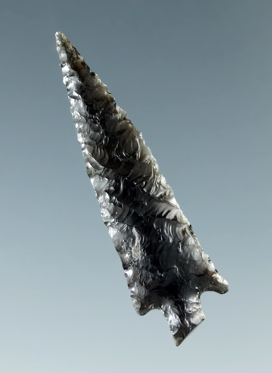 Exceptional flaking on this 1 5/16" Rose Springs made from obsidian found in Oregon.