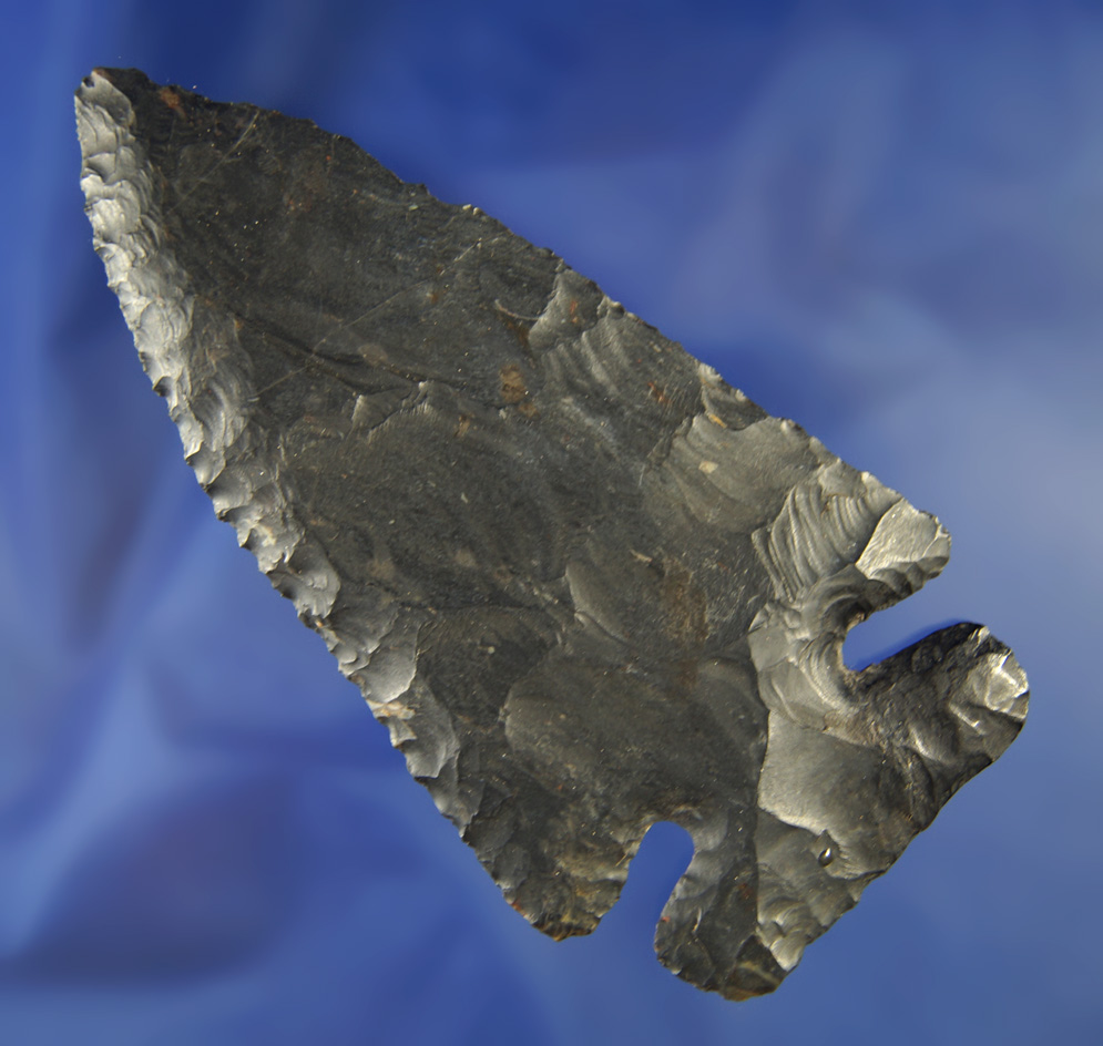 4 3/8" large Ohio Thebes made from Black Zaleski Flint. Restoration to one side of base.