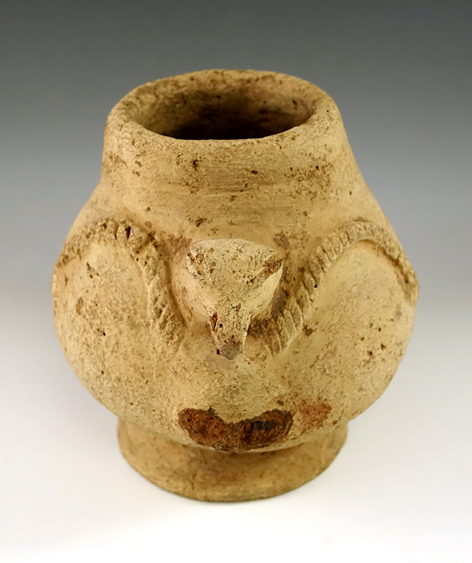 6 1/2" tall pre-Columbian terra-cotta vessel from the Tairona culture of northern Columbia.