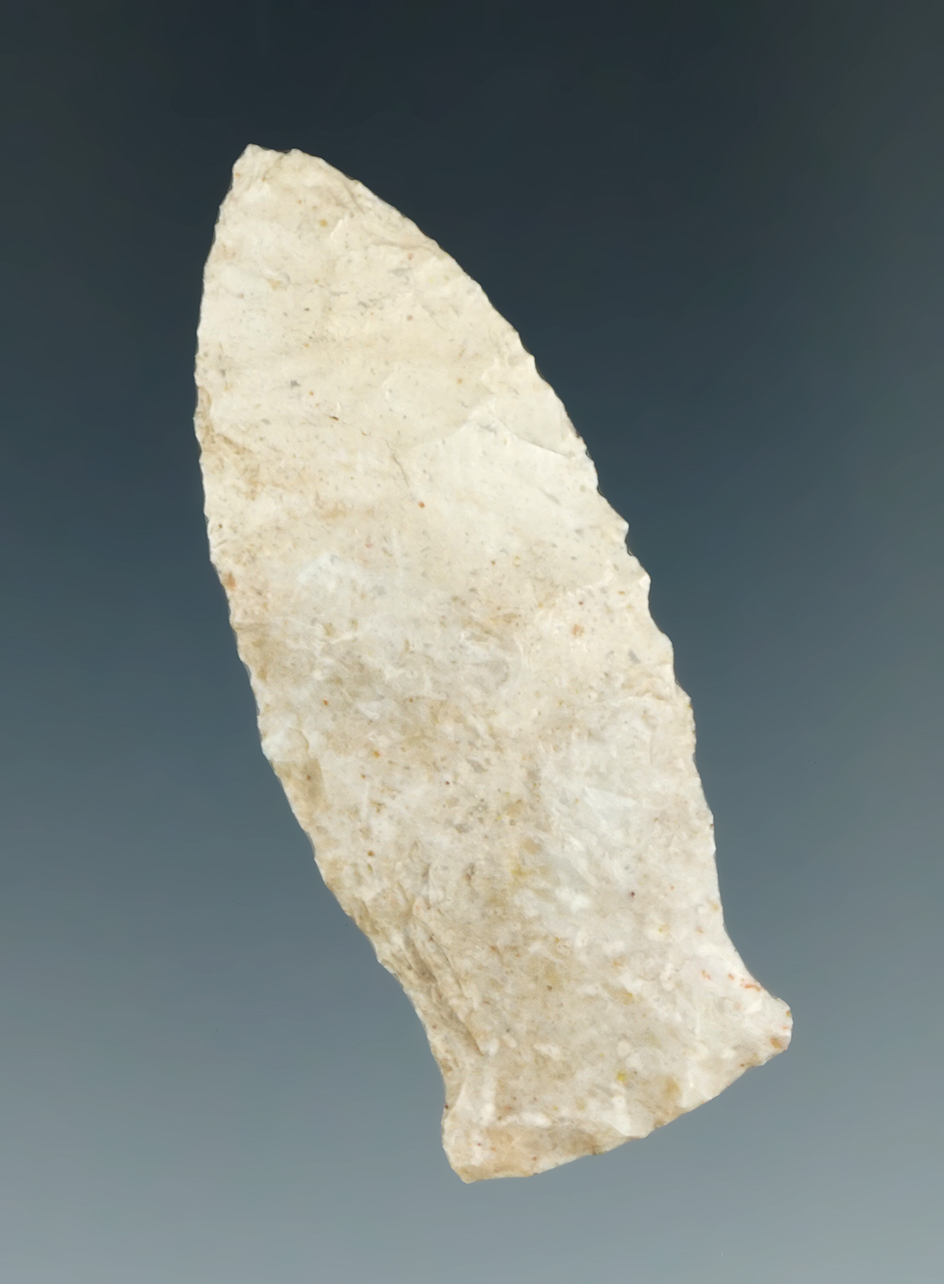 Uniquely styled base on this 2 1/8" expanding stemmed point found in the Lubbock Texas area.