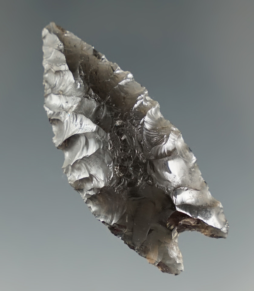 1 13/16" Pinto Basin that is slightly curved made from Obsidian. Found in Warner Valley, Oregon.