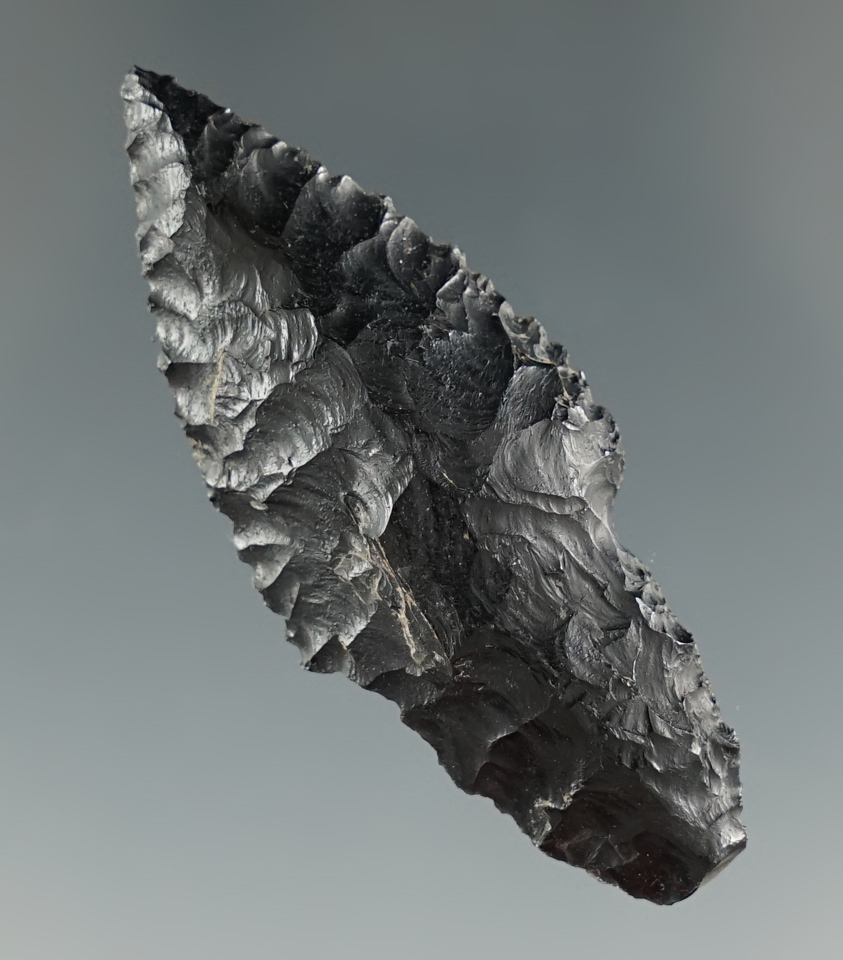 2" Obsidian Parman that is nicely patinated, found near Moses Lake, Washington. Ex. Jim Hogue.