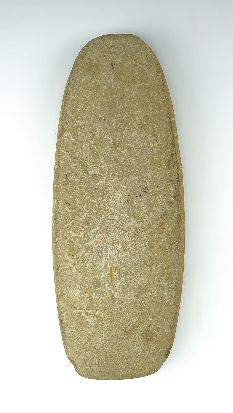 Large 9 1/8" Celt found in the Midwestern U.S. Made from tan colored stone.