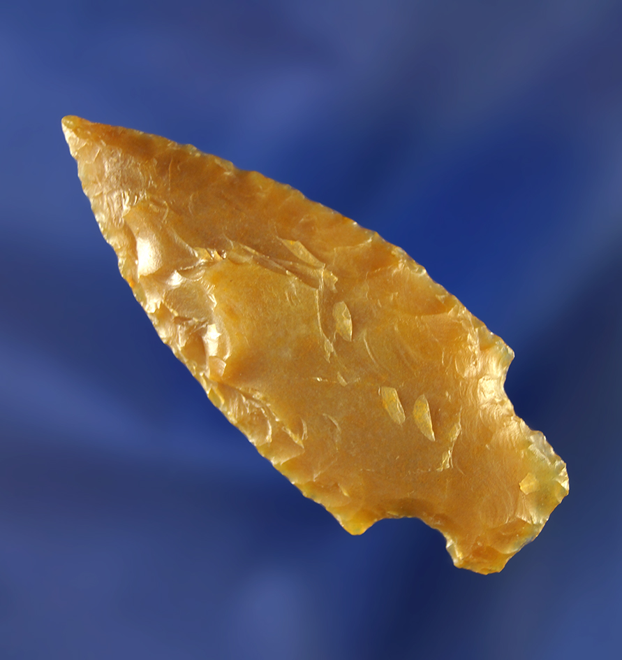 2 5/16" Merrybell made from honey colored material.