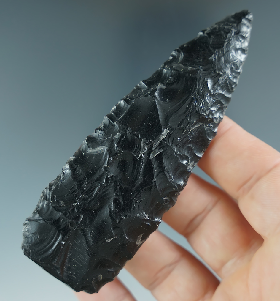 3 13/16" obsidian snapped base knife found in Oregon. Ex. Jim Hogue collection.