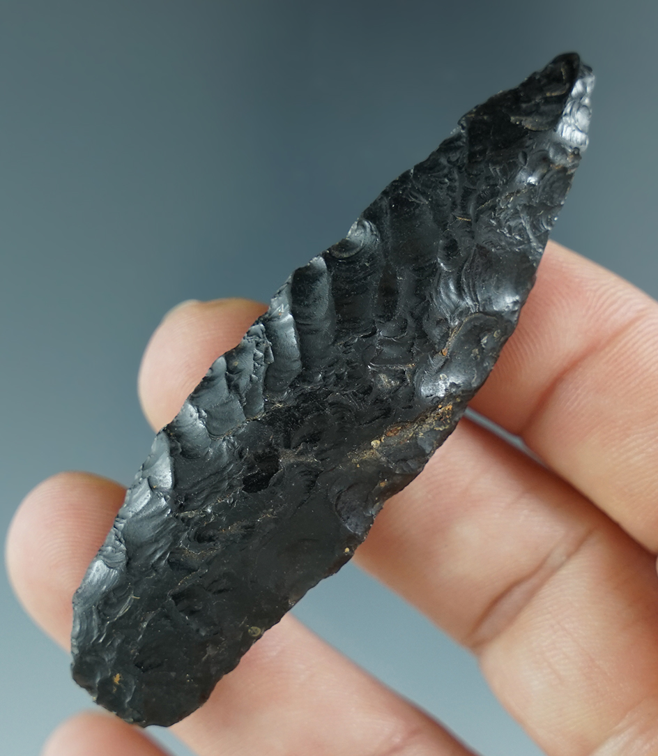 2 3/4" obsidian Agate Basin found in southeast Oregon with nicely ground lower edges.