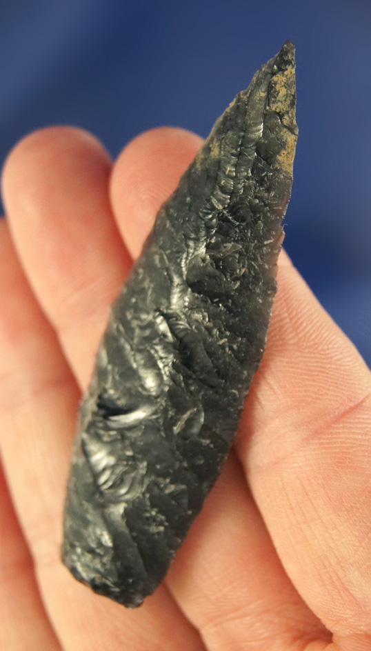 Truly exceptional flaking on this well patinated 2 5/8" Obsidian Cascade found in Oregon.