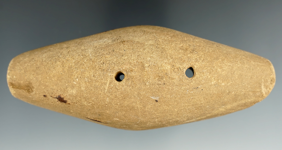 4 3/4" Adena Expanded Center Gorget with some damage to one end. Found in Defiance Co., Ohio.